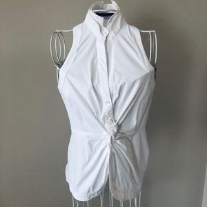 BCBG sleeveless high collar blouse.